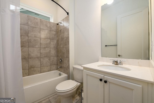 full bathroom with vanity, tile patterned floors, shower / bath combination with curtain, and toilet