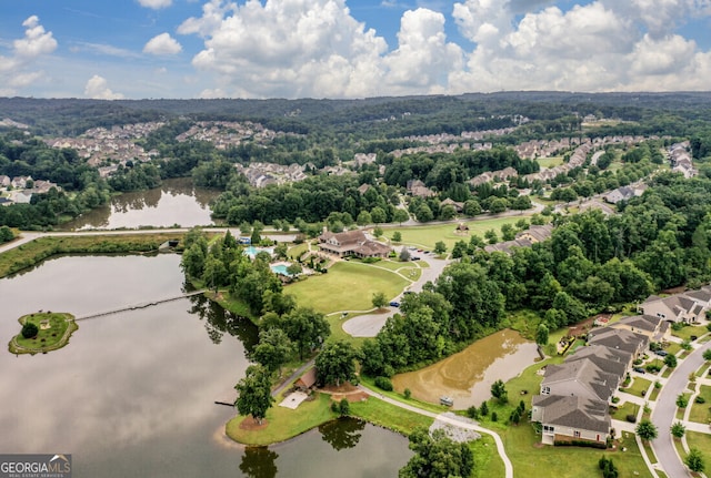 drone / aerial view with a water view