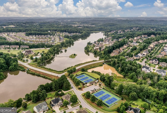 drone / aerial view with a water view