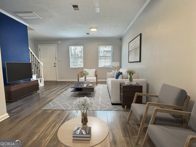 office area with wood-type flooring and ornamental molding