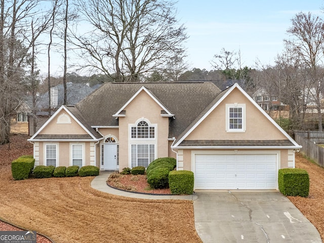 view of front of property with a garage