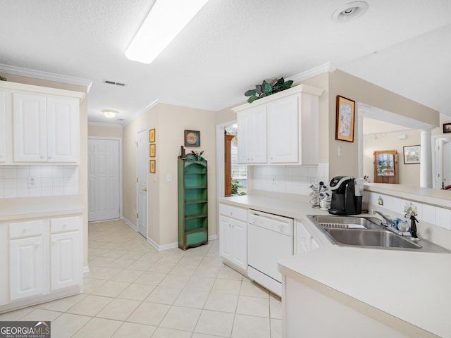 kitchen with sink, crown molding, white cabinets, and dishwasher