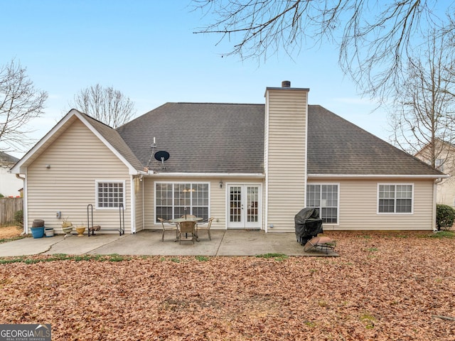 back of property with french doors and a patio