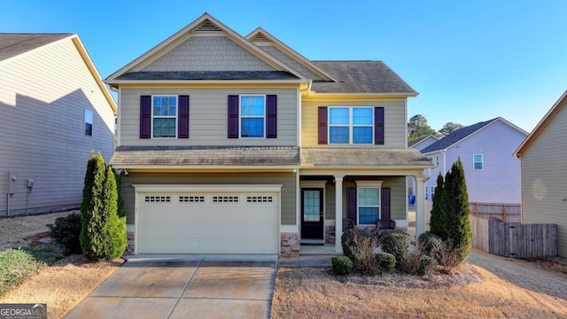 craftsman house with a garage