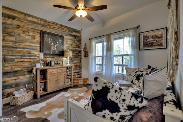 interior space featuring dark hardwood / wood-style floors and ceiling fan