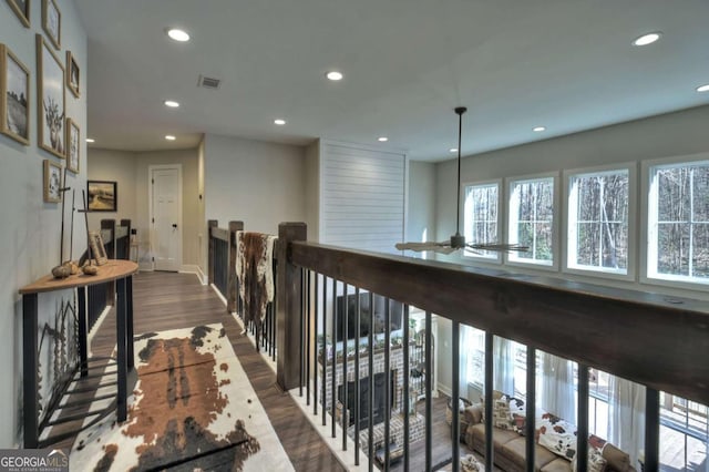 hallway featuring dark hardwood / wood-style flooring