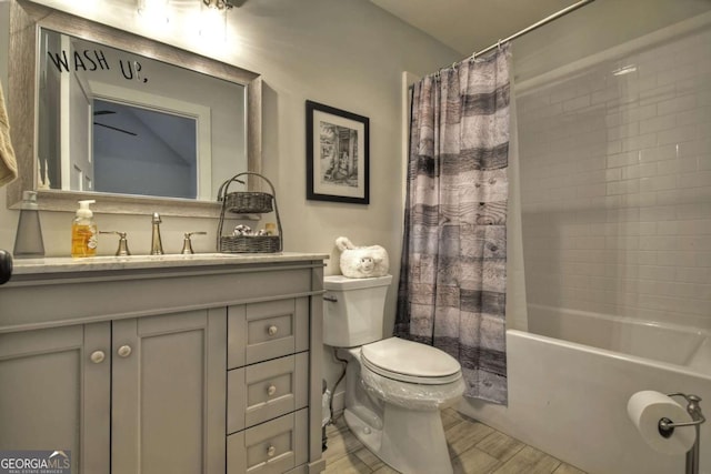 full bathroom with vanity, toilet, and shower / bath combo