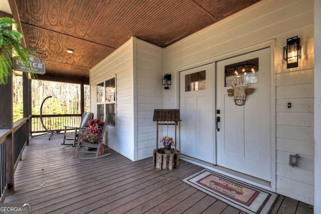 entrance to property with covered porch