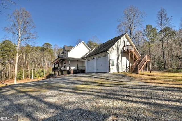 view of side of property with a garage