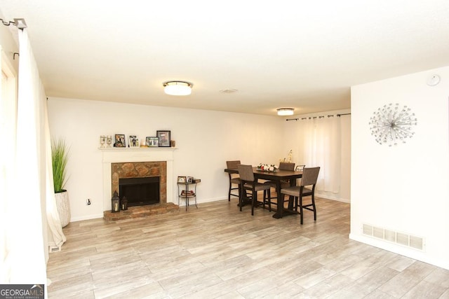 dining space featuring light hardwood / wood-style floors