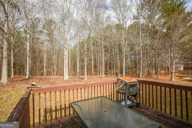 wooden deck featuring grilling area