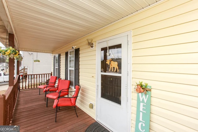 deck featuring covered porch