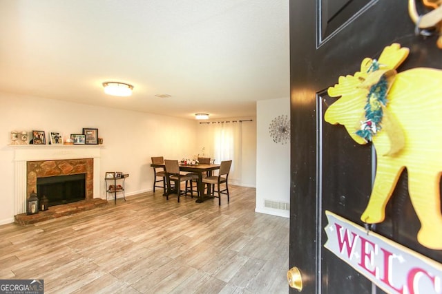 interior space featuring a fireplace and hardwood / wood-style floors