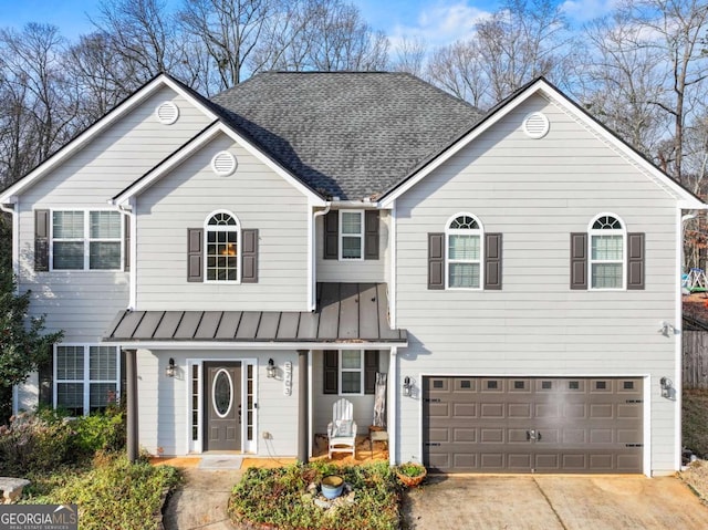 front of property featuring a garage