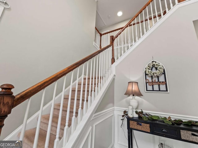 stairway with a high ceiling