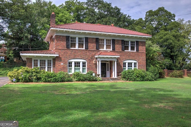 view of front of home featuring a front yard