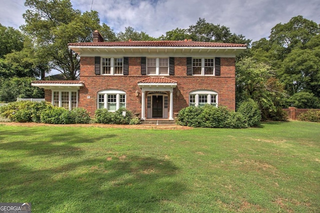 view of front of house with a front yard