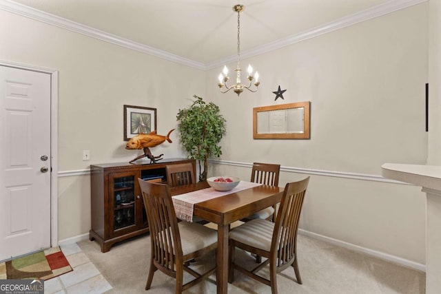 dining area featuring ornamental molding, a chandelier, and light carpet