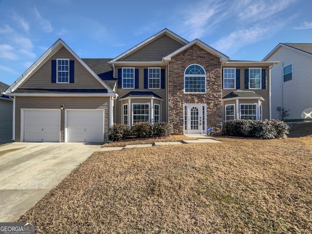 view of front of property featuring a garage