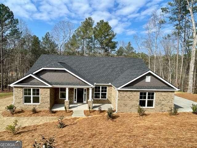 view of front of home featuring a patio