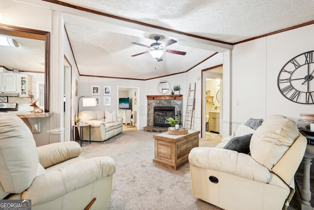 living room featuring crown molding, light carpet, a fireplace, and a textured ceiling