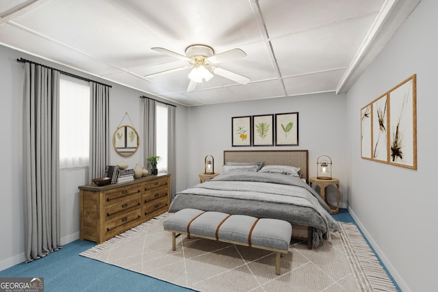 carpeted bedroom featuring ceiling fan