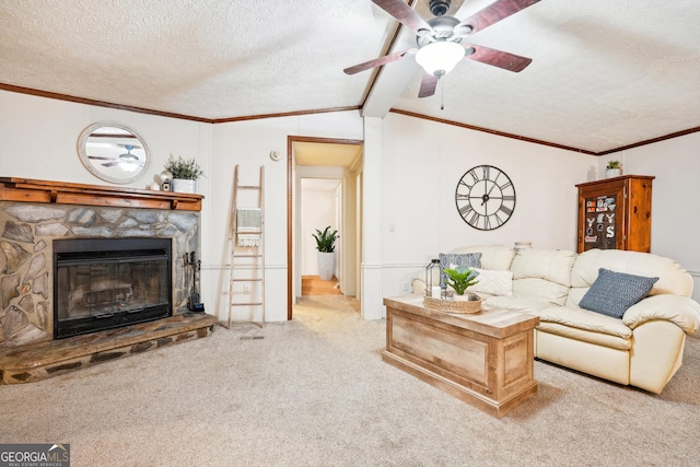 carpeted living room featuring crown molding, a stone fireplace, and a textured ceiling