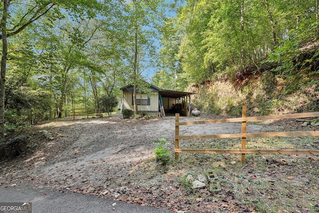 view of front of house with a carport