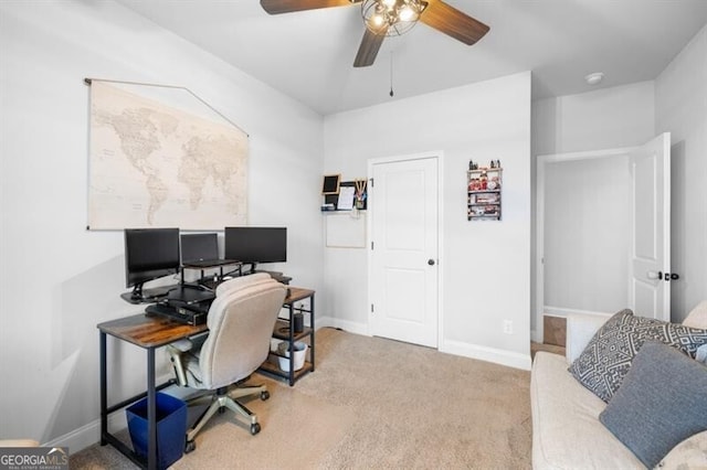 carpeted office with ceiling fan