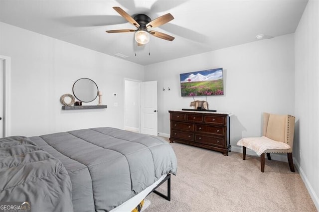 carpeted bedroom featuring ceiling fan