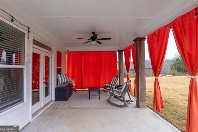 view of patio featuring french doors and ceiling fan