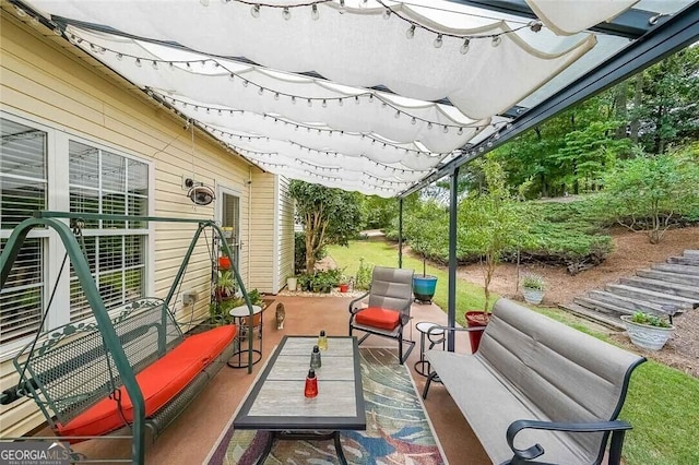 view of patio with a pergola and outdoor lounge area