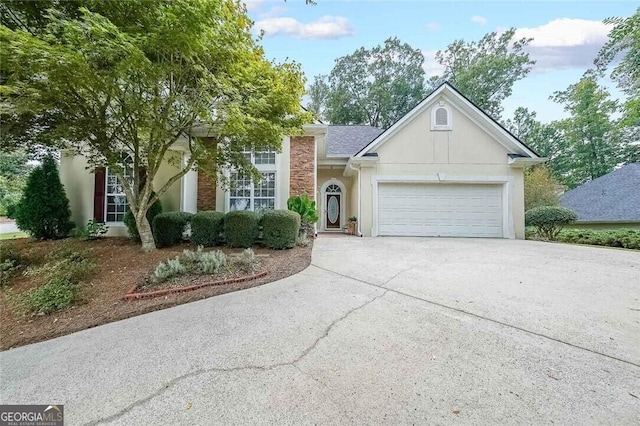 ranch-style home with a garage