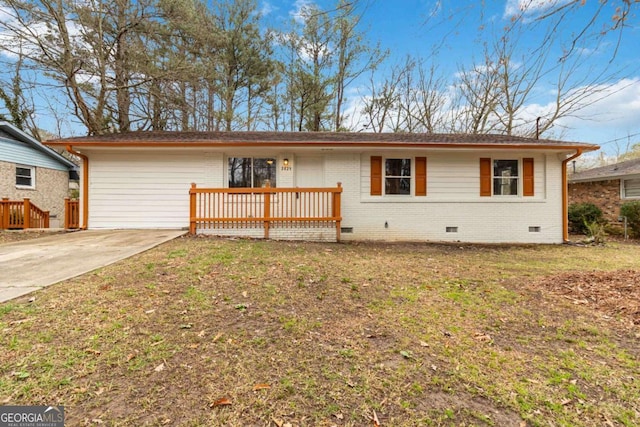 ranch-style house with a wooden deck and a front yard