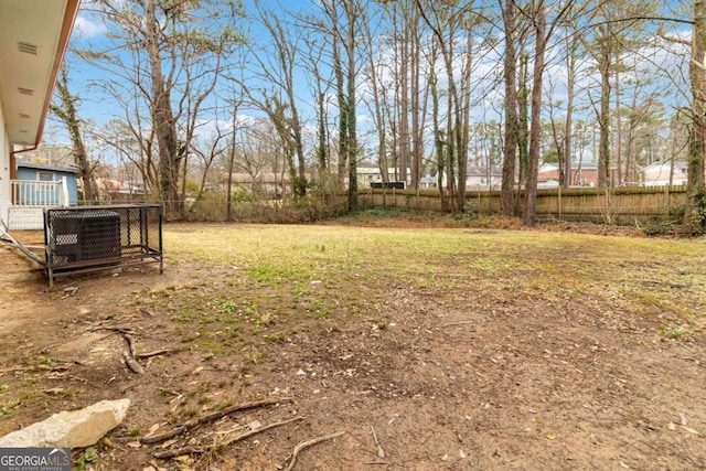 view of yard with central AC unit