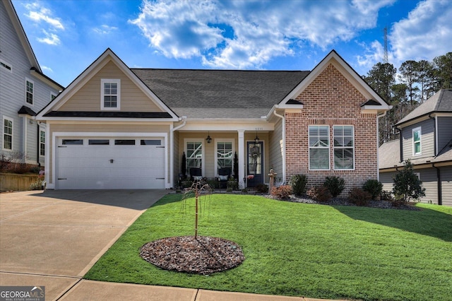 view of front facade with a garage, a shingled roof, concrete driveway, a front lawn, and brick siding