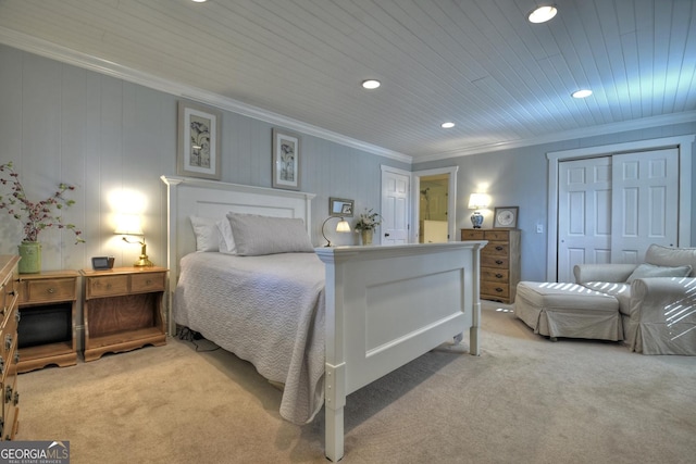 carpeted bedroom with crown molding, wood ceiling, and a closet