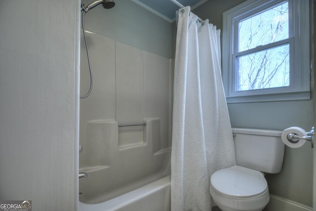 bathroom with shower / tub combo with curtain and toilet