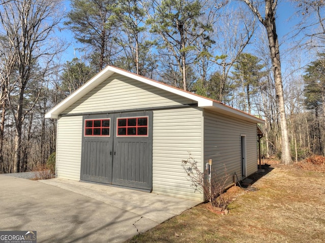 view of outdoor structure featuring a garage