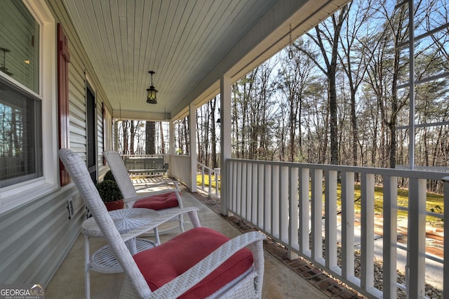 balcony featuring covered porch