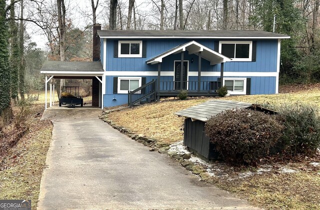 view of front of property with a carport