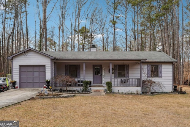 ranch-style home featuring a garage, a front lawn, and covered porch