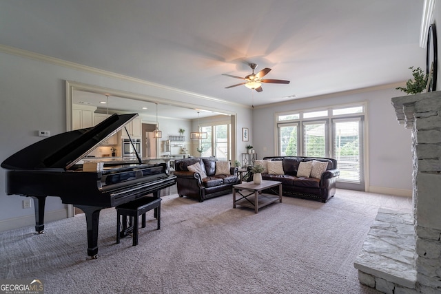 living room featuring crown molding, a healthy amount of sunlight, and light carpet