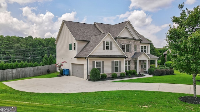 view of front facade featuring a garage, central AC, and a front lawn