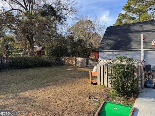 view of yard featuring central AC