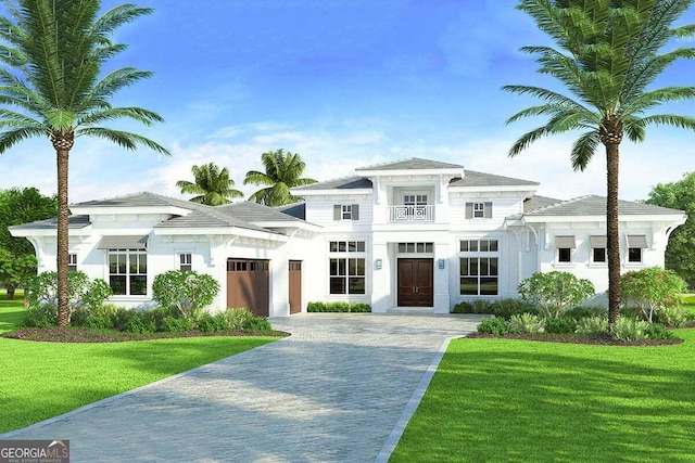 view of front facade with a garage, decorative driveway, and a front lawn