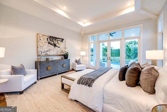 bedroom featuring access to outside and french doors