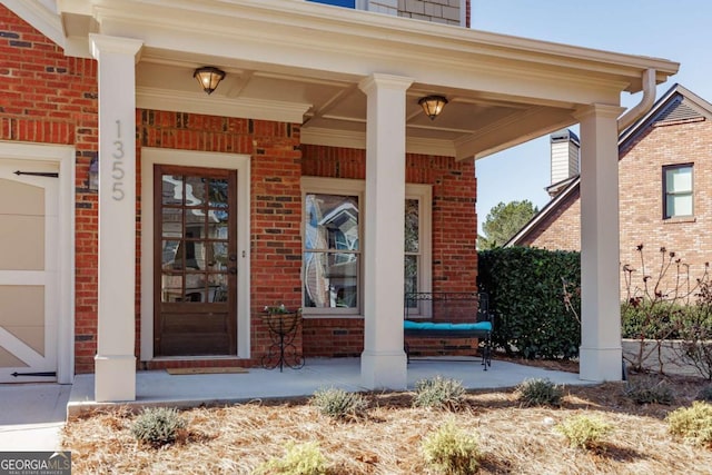 entrance to property with a porch