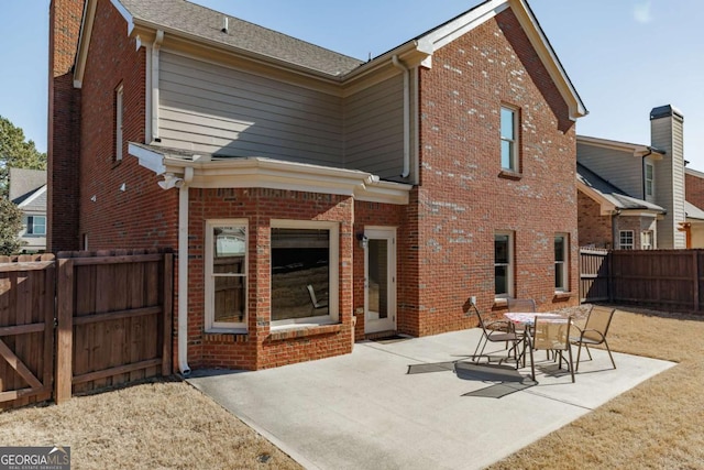 rear view of house with a patio area