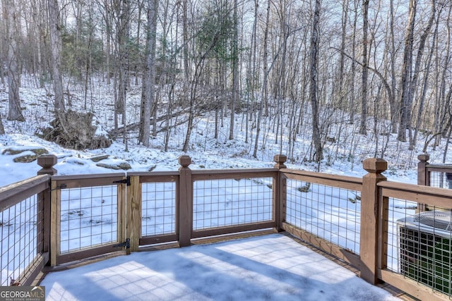 snow covered deck with cooling unit